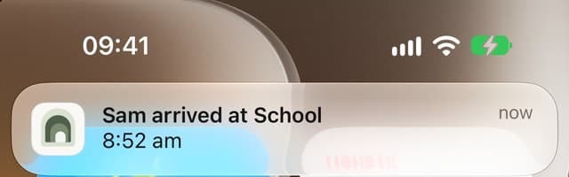Notification on an iPhone: Sam arrived at School, 8:52am